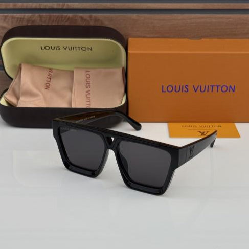 Black sunglasses with Louis Vuitton case and box on a light gray background