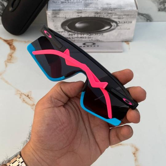 Oakley Black-Blue-Pink Sunglasses – Sporty Style with Bold Edge
